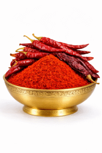 Guntur Kashmiri Kaddi mix chilli powder in brass bowl with whole red chillies