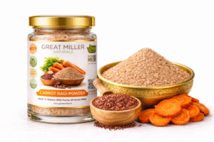 GreatMiller Carrot Ragi Powder in glass jar with brass bowl of carrot and ragi powder blend with fresh ingredients
